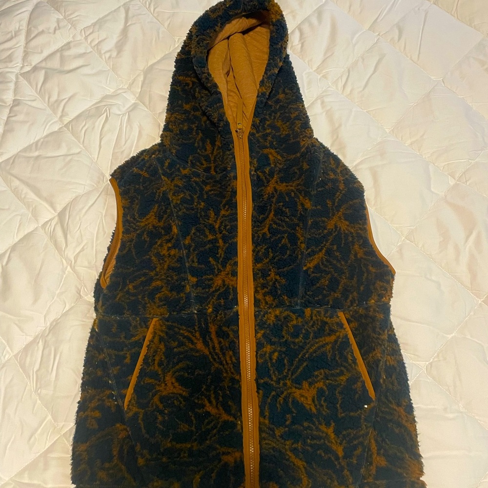 Small fuzzy prana vest- fits oversized.